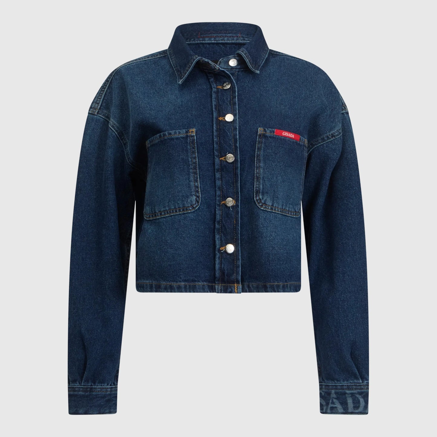 Front view of washed blue cropped denim shirt with Gisada red patch
