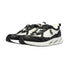 Side view of Gisada black and white mesh sneakers – luxury performance design
